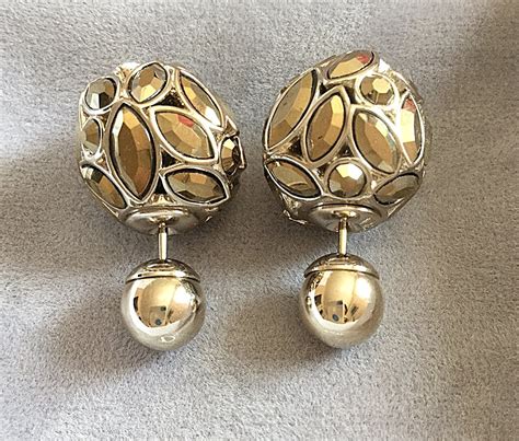 Dior tribal clip earrings